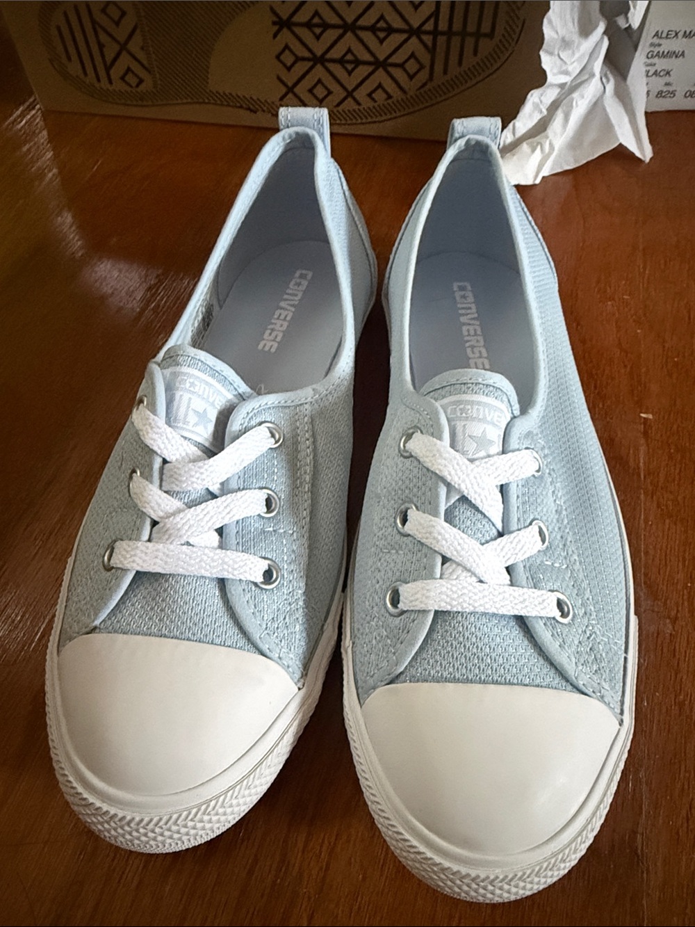 Converse Light Blue Low Top Slip-On Sneakers